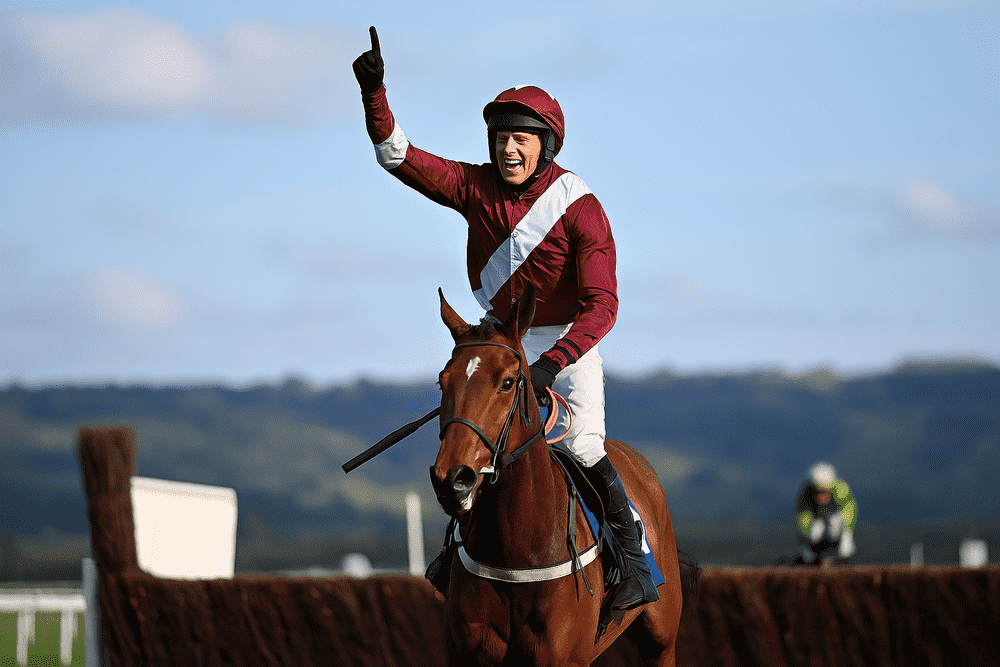 Winning jockey raising hand in celebration after steeplechase race – Nicky Henderson horses to follow 2025/26