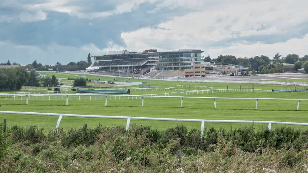 Cheltenham Racecourse with the grandstand and track in view during Festival week